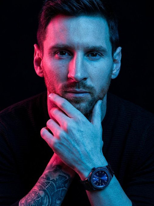 Dual-tone blue and pink neon lit portrait