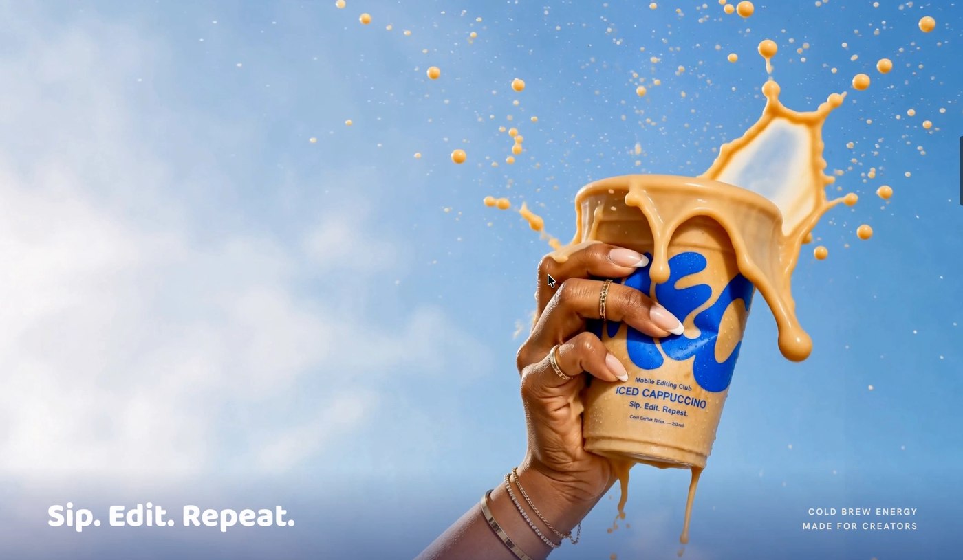 MEC Coffee brand website hero — hand holding an iced cappuccino cup exploding upward with cream splash against a blue sky, with 'Sip. Edit. Repeat.' tagline